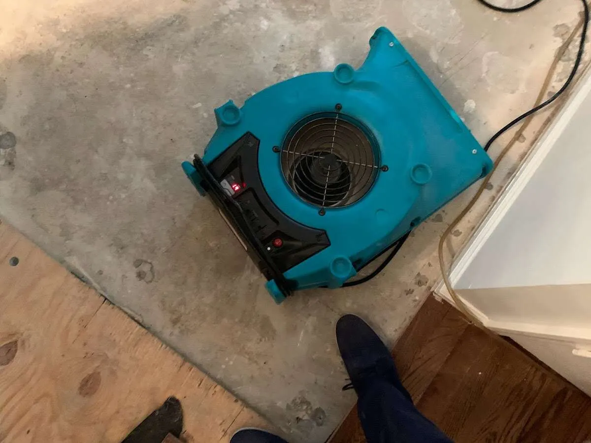 Air mover drying subfloor during Leak Detection & Repair in Towamencin